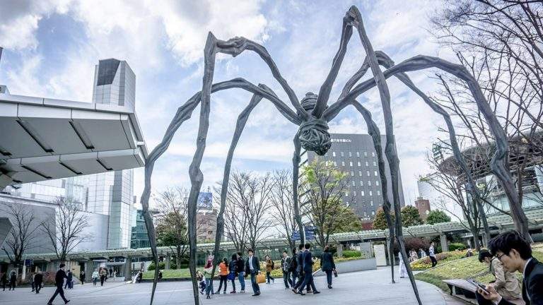 large spider sculpture in an open public space