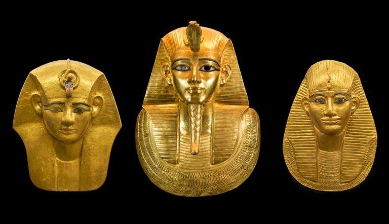 Three Egyptian Gold mummy masks of Pharaohs from ancient egypt